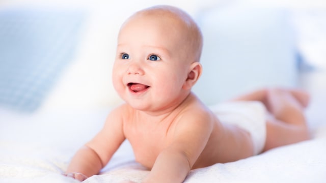 Bayi tersenyum  (Foto: THINKSTOCK)