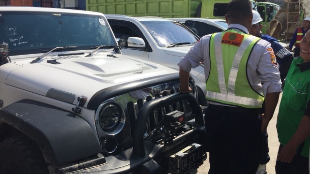 Mobil mewah sitaan KPK. (Foto: Fachrul Irwinsyah/kumparan)