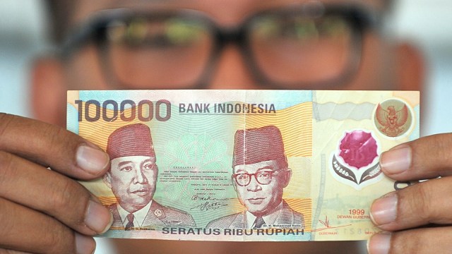 Ilustrasi mata uang Rupiah. (Foto: AFP/Bay Ismoyo)