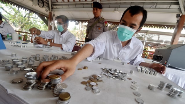 Ilustrasi uang koin Rupiah. (Foto: AFP/Bay Ismoyo)