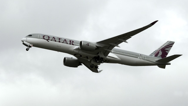 Pesawat Qatar Airways. (Foto: AFP PHOTO /Pascal Pavani)