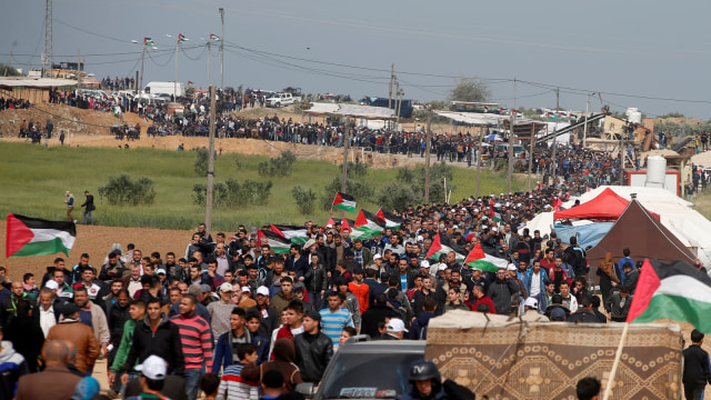 Bentrok di Aksi Hari Tanah Gaza. (Foto: REUTERS/Mohammed Salem)