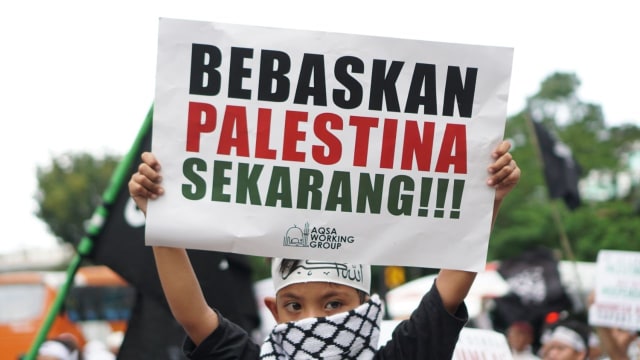 Aksi dukung Great Return March Palestina. (Foto: Nugroho Sejati/kumparan)