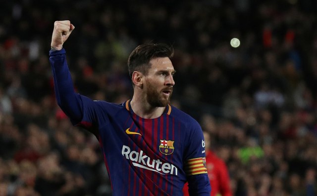 Selebrasi Lionel Messi. (Foto: REUTERS/Albert Gea)