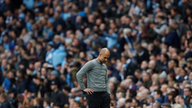 Guardiola menerima kenyataan pahit. (Foto: Lee Smith/Reuters)