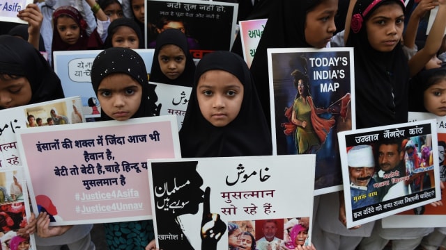 Protes perkosaan bocah di India. (Foto: AFP/Punit Paranjpe)