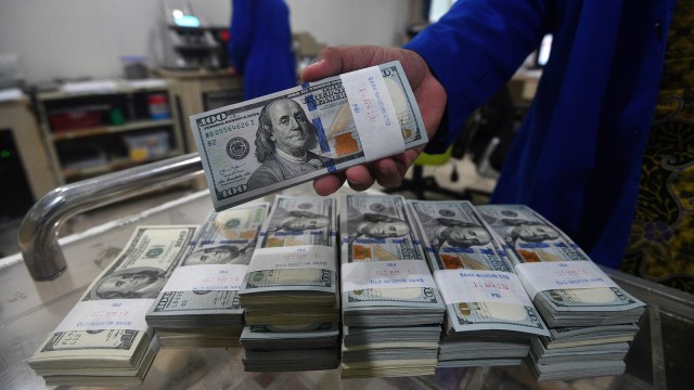Ilustrasi uang dolar (Foto: ANTARA FOTO/ Sigid Kurniawan)
