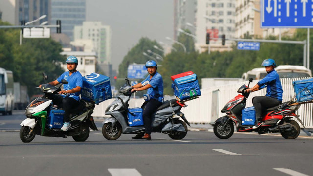 Petugas food delivery berbasis aplikasi (Foto: China Daily)