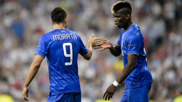 Morata dan Pogba saat berseragam Juventus. (Foto: DANI POZO / AFP)
