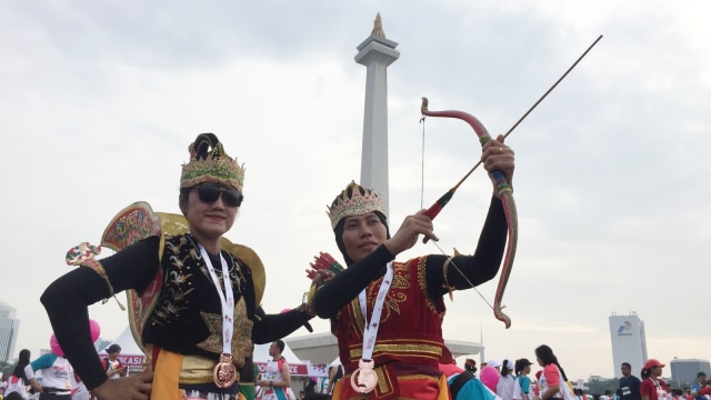 Gatot Kaca dan Srikandi di Kartini Run 2018. (Foto: Fachrul Irwinsyah/kumparan)