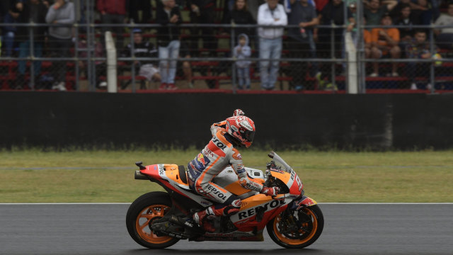 Marquez usai menyelesaikan balapan. (Foto: JUAN MABROMATA / AFP)
