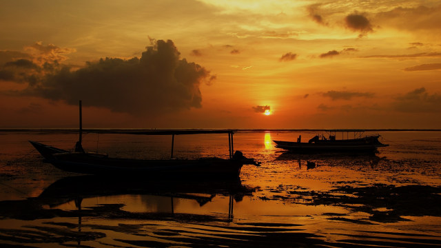 Sunrise cantik menyapa Pantai Sanur (Foto: Flickr / Sergey Andreevich)