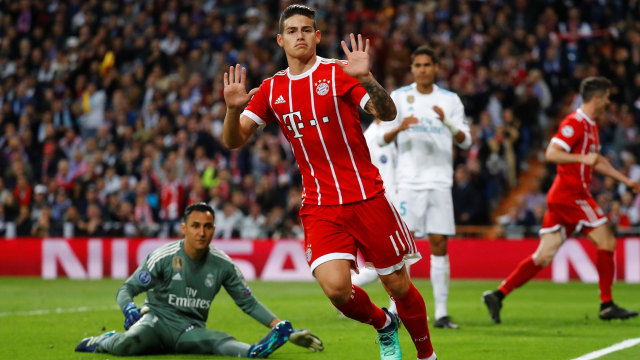 Rodriguez tidak merayakan golnya ke gawang Madrid. (Foto: REUTERS/Kai Pfaffenbach)