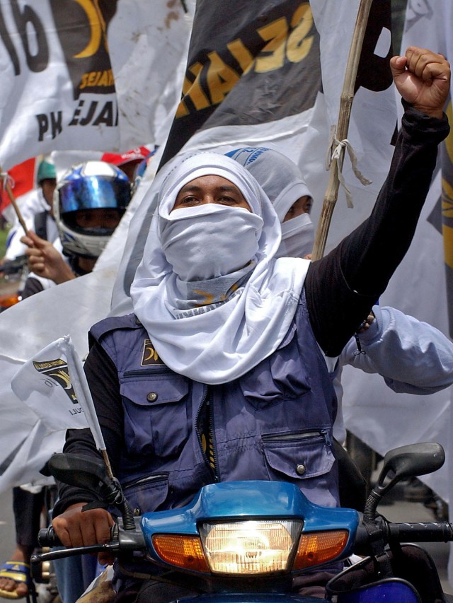 Pendukung Partai Keadilan Sejahtera. (Foto: AFP PHOTO / Bay Ismoyo)