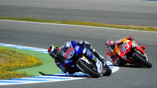 Lorenzo vs Marquez di Jerez 2013. (Foto: CRISTINA QUICLER / AFP)