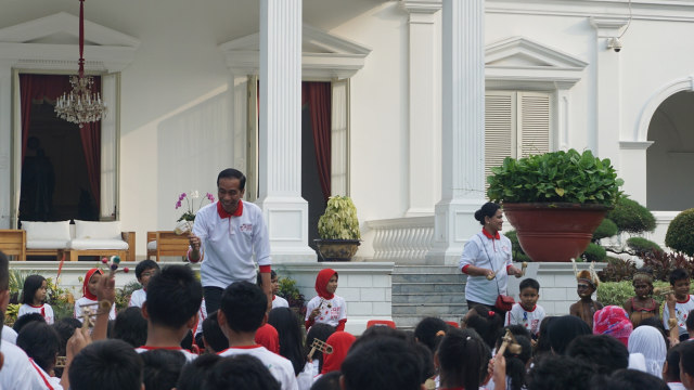 Jokowi dan Iriana hadiri acara Jam Main Kita (Foto: Yudhistira Amran/kumparan)