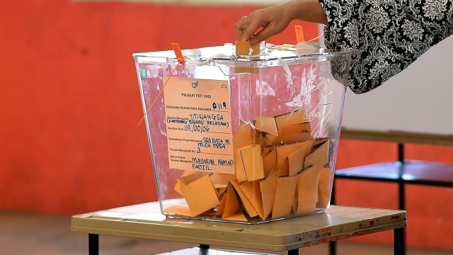 Suasana pemilu di Malaysia. (Foto: AFP/Manan Vatsyayana)