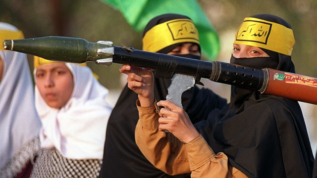 Ilustrasi teroris perempuan (Foto: AFP/Aamir QURESHI)