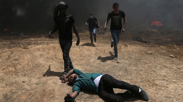 Demonstrasi di Gaza. (Foto: Reuters/Ibraheem Abu Mustafa)