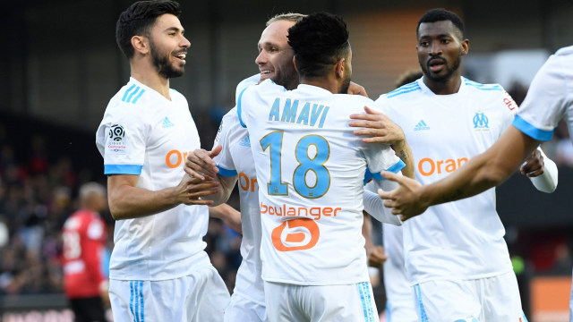 Para pemain Marseille merayakan gol. (Foto: Fred Tanneau / AFP)
