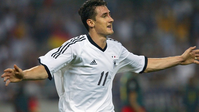 Klose saat membela Jerman pada Piala Dunia 2002 (Foto: PEDRO UGARTE / AFP)