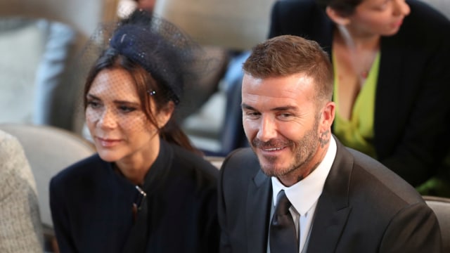 Victoria dan David Beckham. (Foto: Danny Lawson/Pool via REUTERS)