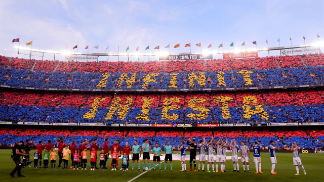Koreo 'Infinit Iniesta' jelang laga. (Foto: AFP/Josep Lago)