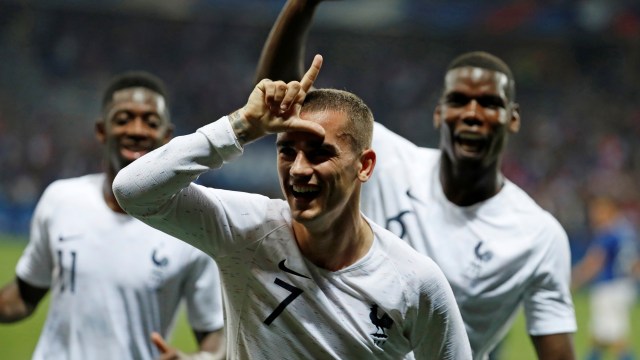 Griezmann merayakan golnya. (Foto: REUTERS/Eric Gaillard)