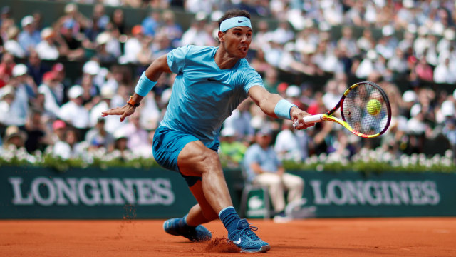 Rafael Nadal di babak ketiga Roland Garros. (Foto: REUTERS/Christian Hartmann)