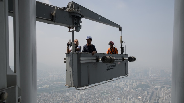 Alain Robert Panjat  Lotte World Tower (Foto: Jung Yeon-je / AFP)