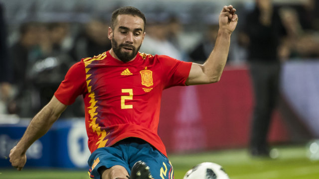 Dani Carvajal kala beraksi untuk Spanyol. (Foto: Odd Andersen/AFP)