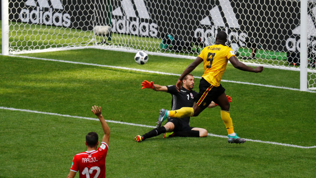 Lukaku cetak gol ketiga Belgia. (Foto: REUTERS/Kai Pfaffenbach)