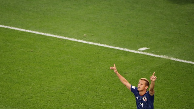 Keisuke Honda rayakan golnya. (Foto: REUTERS/Marcos Brindicci)