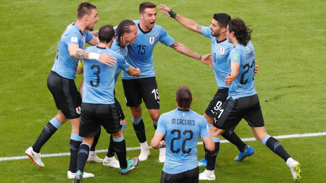 Timnas Uruguay rayakan gol ke gawang Rusia. Foto: REUTERS/David Gray