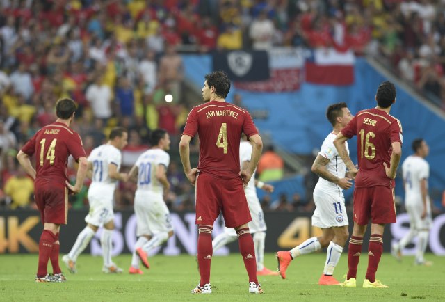 Spanyol gagal di Piala Dunia 2014. (Foto: LLUIS GENE / AFP)