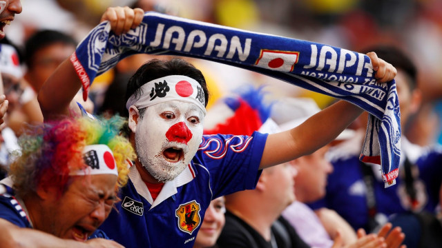 Aksi suporter Timnas Jepang di Piala Dunia. (Foto: Reuters/Jason Cairnduff)