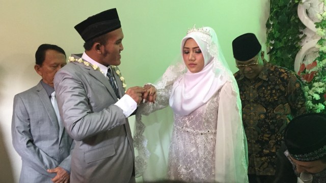 Pernikahan Caisar dan Intan. (Foto: Maria Gabrielle Putrinda/kumparan)