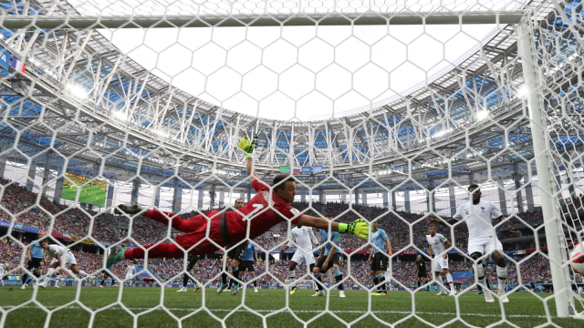 Uruguay vs Prancis (Foto: Jason Cairnduff/Reuters)