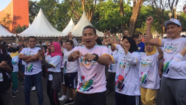 Sandi dan Rini di Antam Gold Run di TMII (Foto: Mohammad Fajri/kumparan)