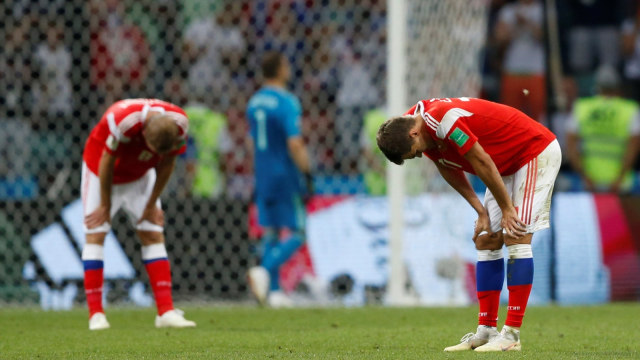 Ekspresi pemain-pemain Rusia usai gagal lolos ke semifinal Piala Dunia 2018. (Foto: Carl Recine/Reuters)