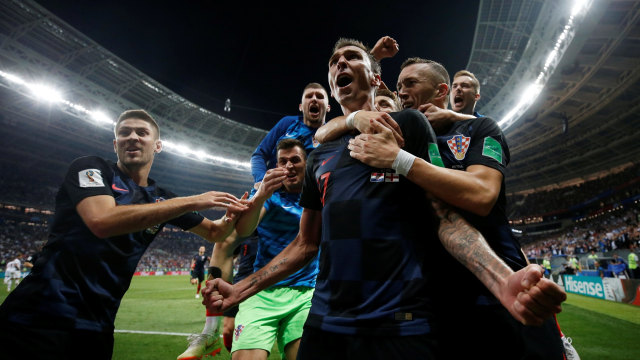 Mandzukic merayakan gol ke gawang Inggris. (Foto: REUTERS/Carl Recine)