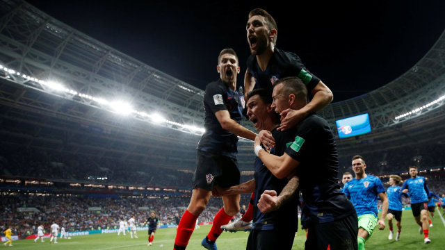 Selebrasi Mario Mandzukic dkk. usai mencetak gol kedua ke gawang Inggris. (Foto: Carl Recine/Reuters)