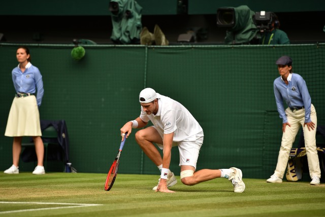 John Isner di semifinal Wimbledon 2018. (Foto: Ben Curtis/Pool via Reuters)