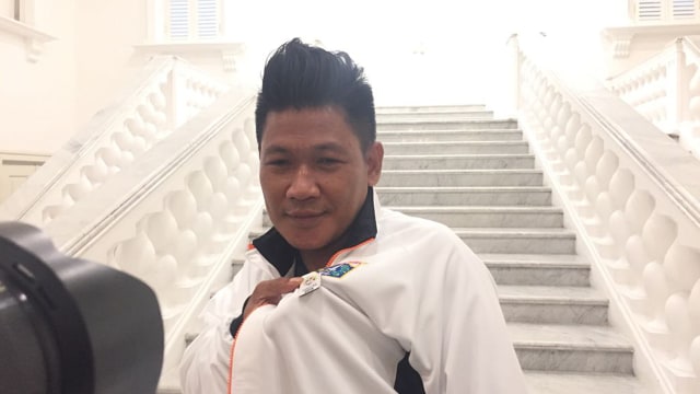 Tamran, Warga yang memasang bendera negara peserta asian games