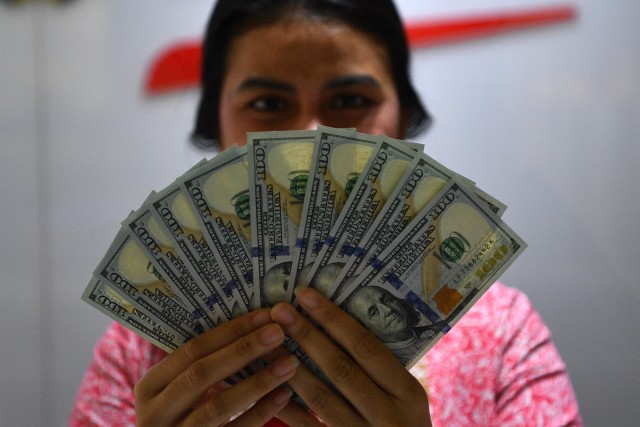 Ilustrasi Dolar-Rupiah (Foto: ANTARA FOTO/Sigid Kurniawan)