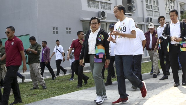 Jokowi dan Cak Imin  di venue Asian Games di Palembang. Foto: Antara/Nova Wahyudi