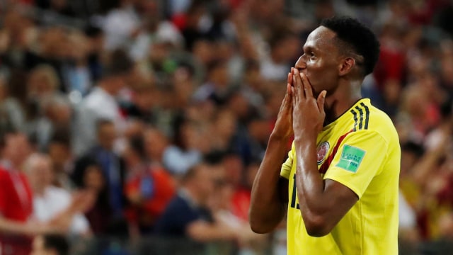 Yerry Mina rayakan gol di laga vs Inggris. Foto: REUTERS/Maxim Shemetov