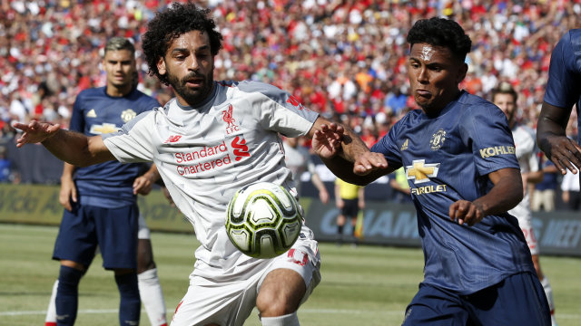 Liverpool vs Manchester United di ICC 2018. (Foto: JEFF KOWALSKY / AFP)