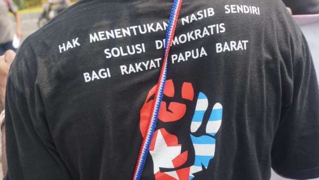 Aliansi Mahasiswa Papua (AMP) dan Front Rakyat Indonesia untuk West Papua (FRI-WP) melakukan aksi unjuk rasa di depan Istana, Jakarta, Kamis (2/8). (Foto: Irfan Adi Saputra/kumparan)