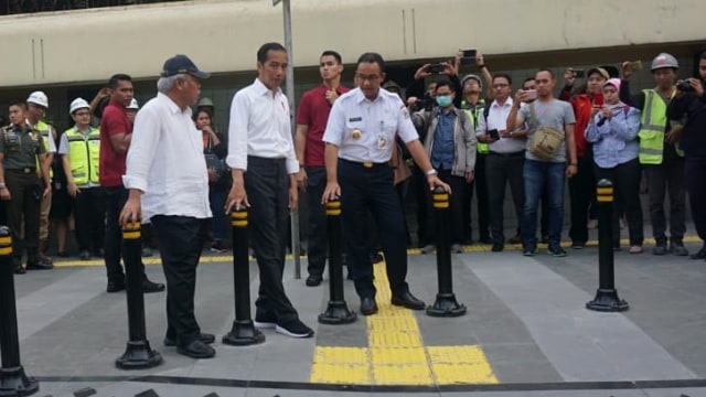 Presiden Joko Widodo bersama Anies Baswedan (Foto: Yudhistira Amran Saleh/kumparan)